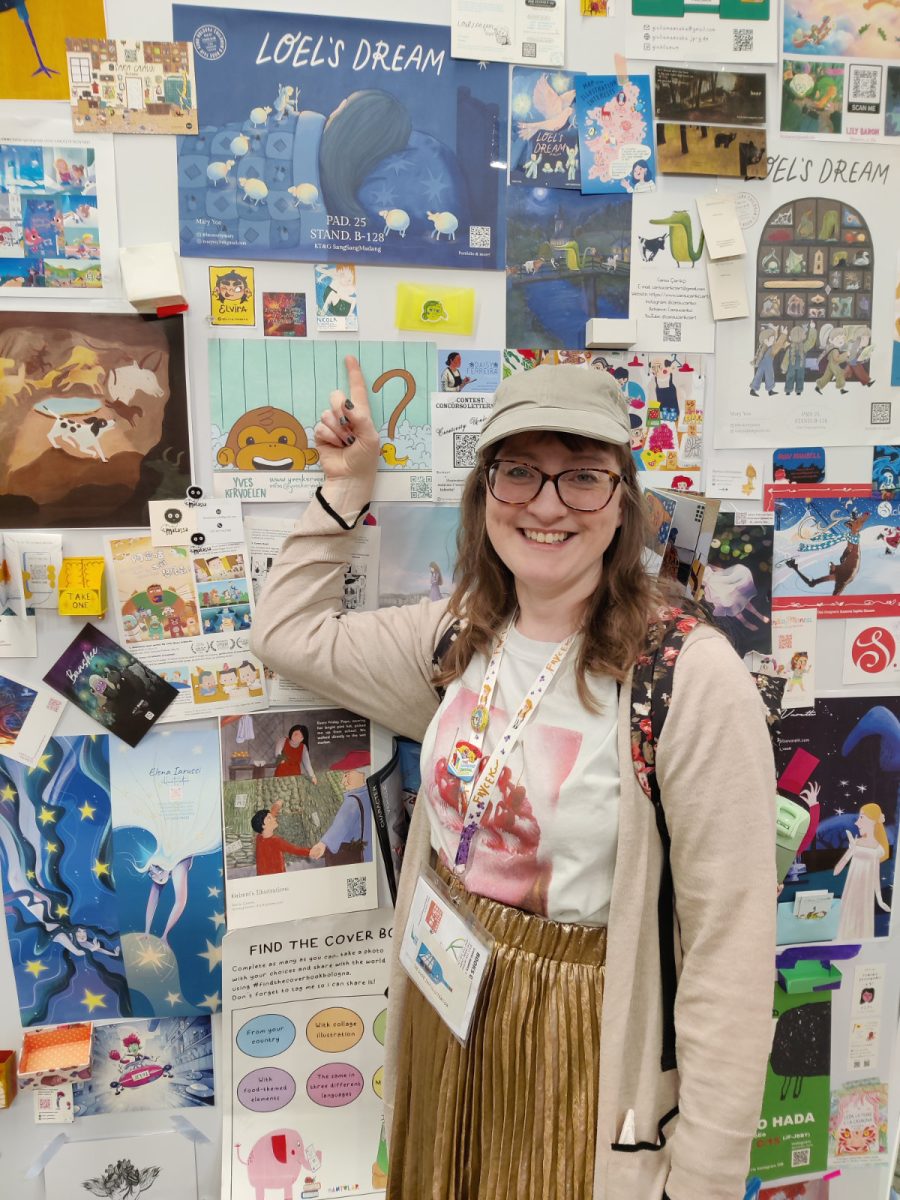 My tiny business card on the illustrator's wall at Bologna Children's Book Fair 2025